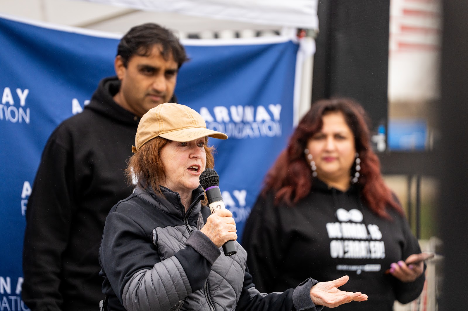 Sharmistha and Tarun speaking at the Beach Safety Run